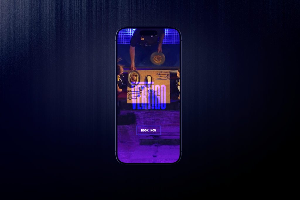 A smartphone displays a vibrant purple and blue restaurant booking app interface, showing a top-down view of a table being set and a "BOOK NOW" button. The screen features the word "VERTIGO" in bold text.