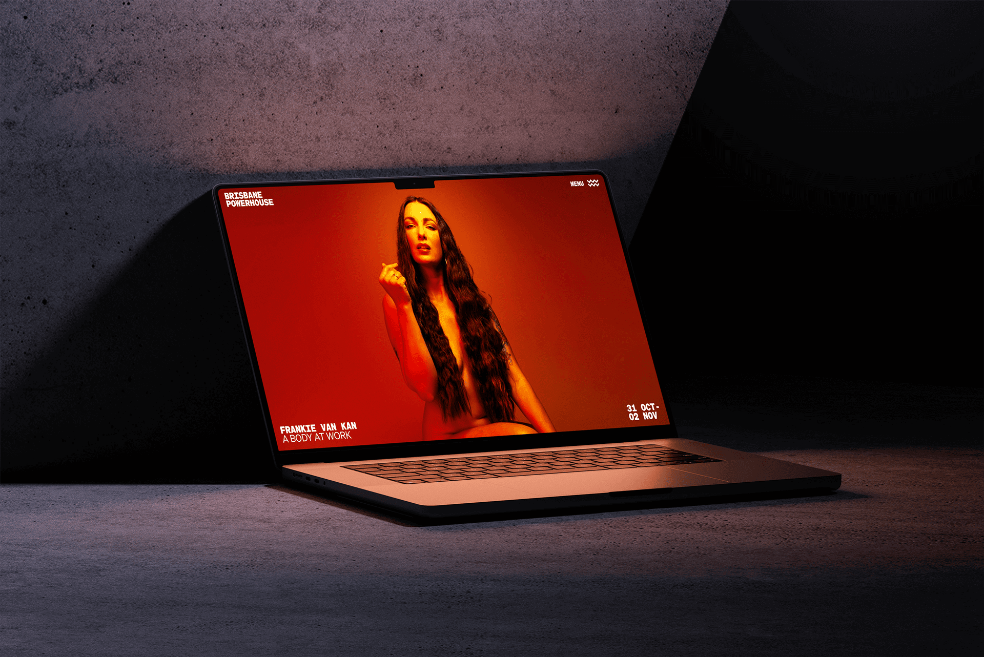 A laptop on a dark surface displays a woman with long hair and dramatic red lighting, posing against a red background. On-screen text includes "Berghain Pornhouse," event details, and the date "31 Oct - 1 Nov.