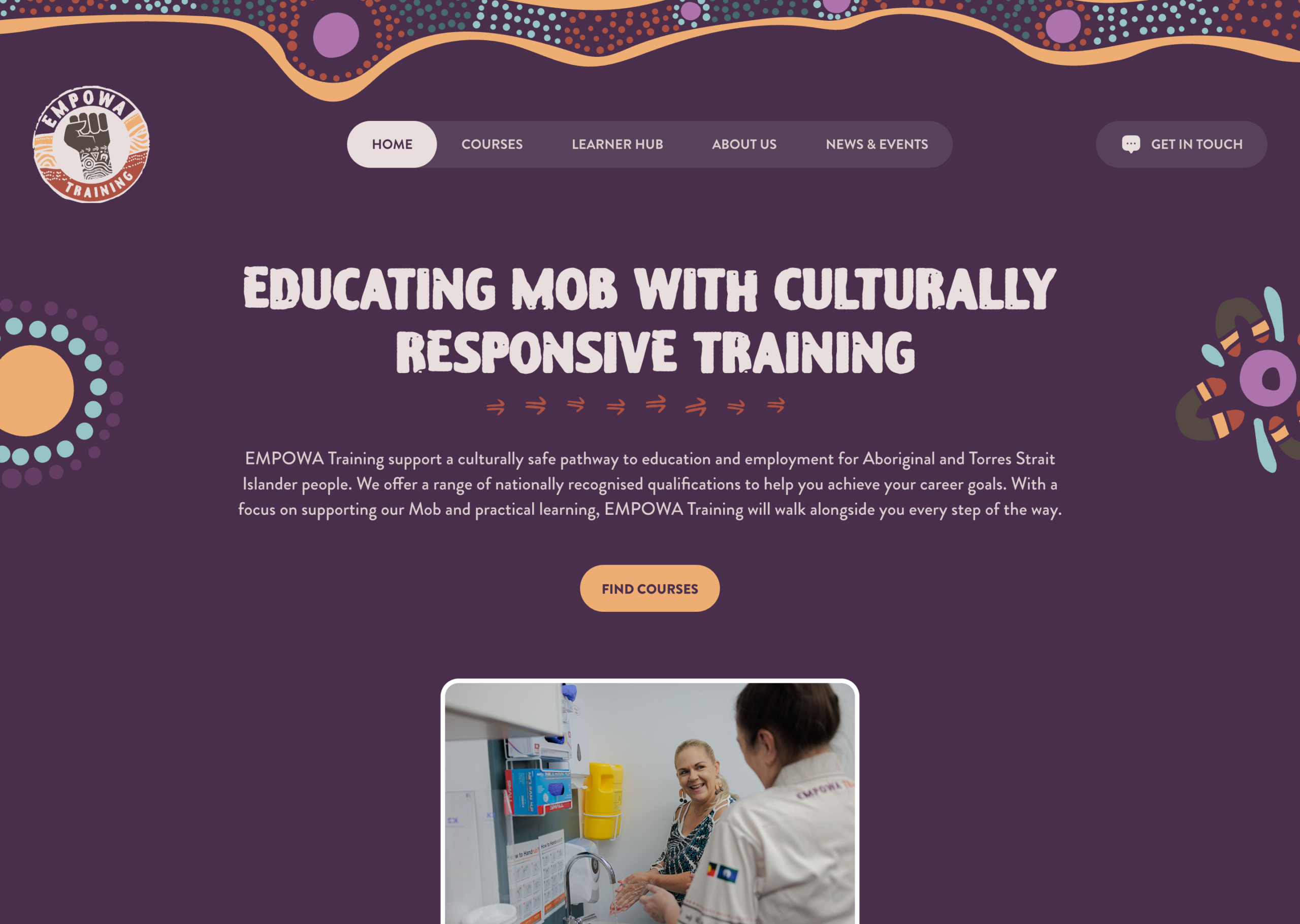 Screenshot of a website homepage for EMPOWA Training, featuring Aboriginal art designs, text promoting culturally responsive training for Aboriginal and Torres Strait Islander people, and a photo of two women conversing in a healthcare setting.